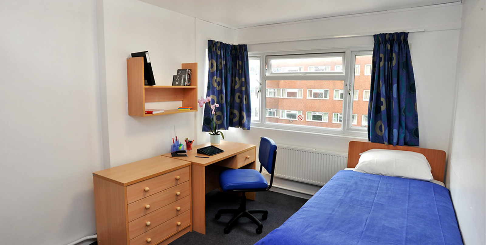 Comfortable furnished room at Holdings India Ladies Hostel near Siruseri and Navalur