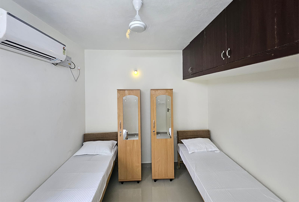 2 sharing AC room for ladies at Holdings India Hostel Padur